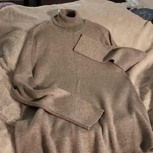 Chicos soft, cool wear turtle neck sweater.